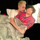  Miley Cyrus climbs into bed with One Direction’s Harry Styles