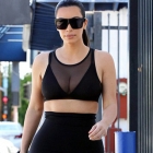  Kim Kardashian in Revealing Mesh Crop Top and Pencil Skirt