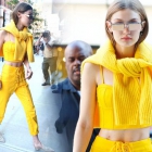 Gigi Hadid cuts a slender frame in preppy bright yellow outfit